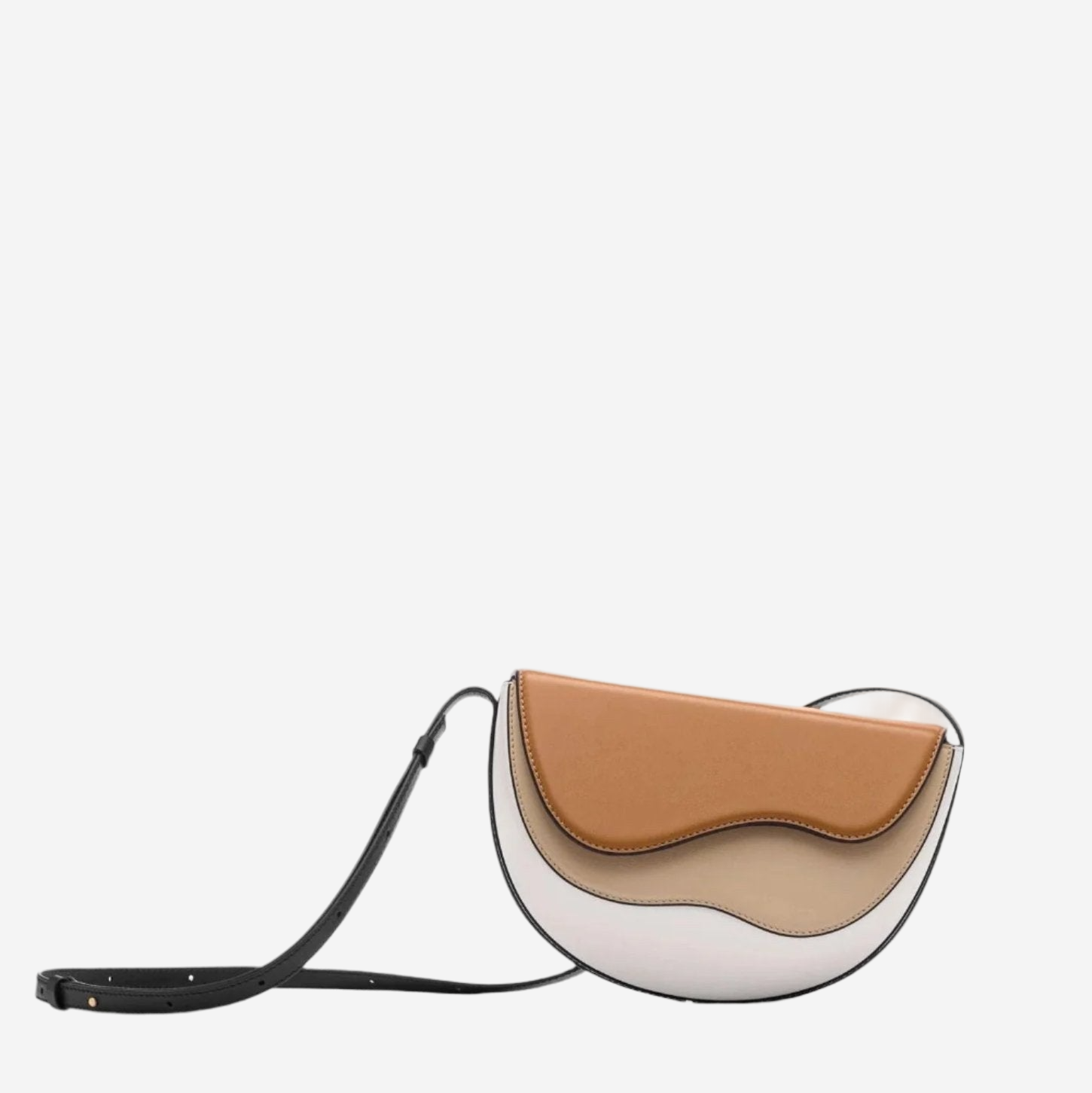 A small, round, leather handbag with a curved shape and a black strap.