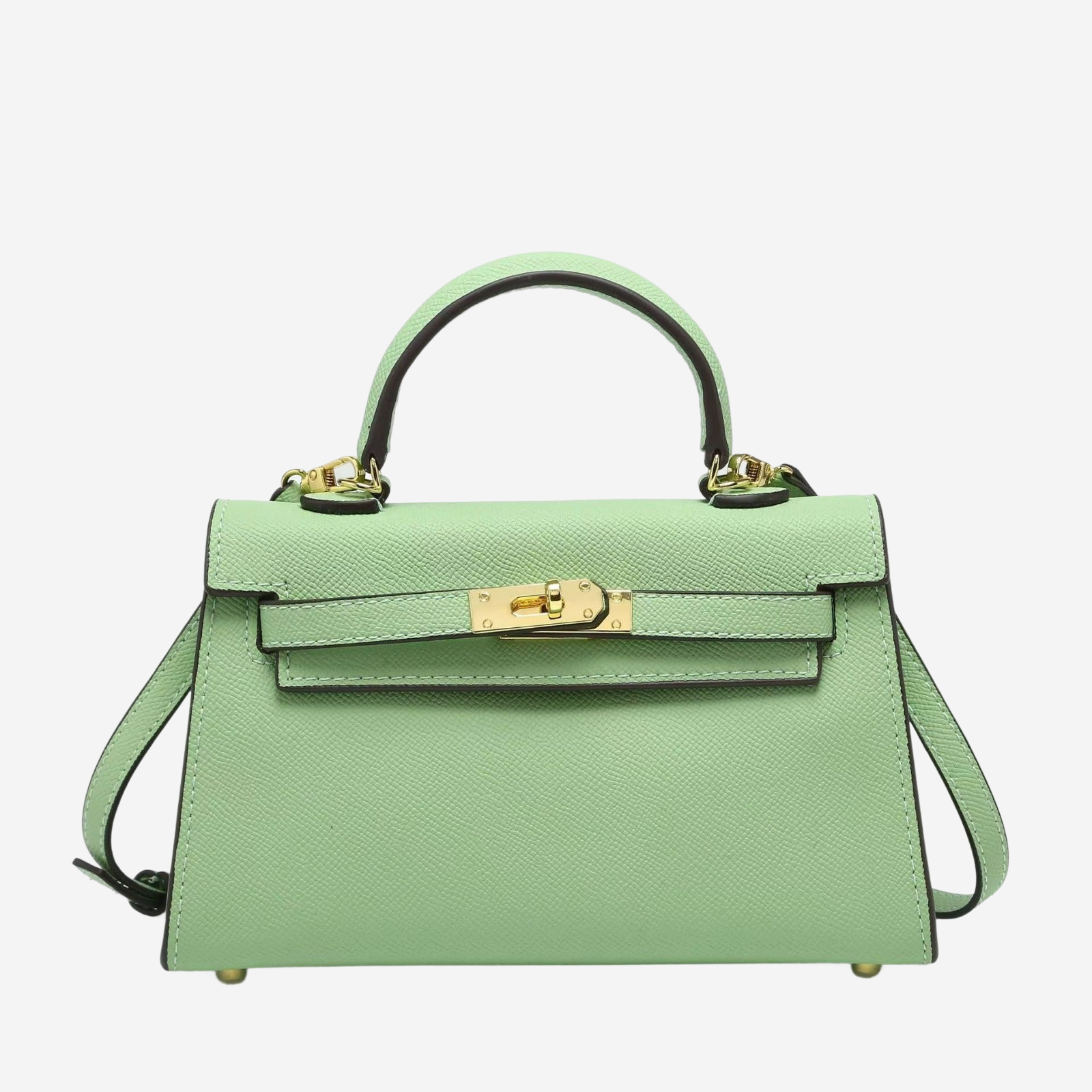 A mint green handbag with a gold lock detail and handle.