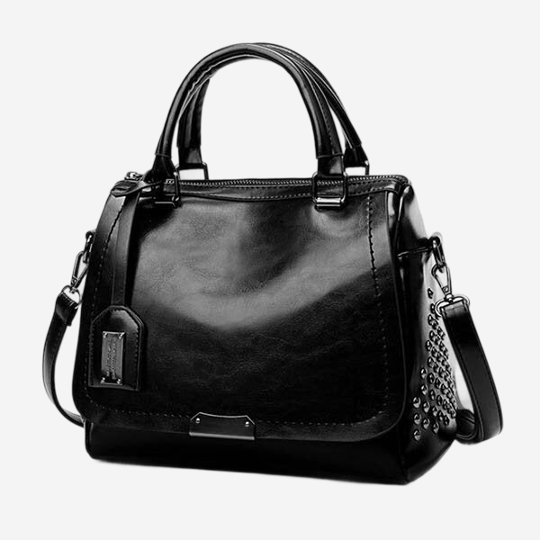 A black leather handbag with silver studs on the side.