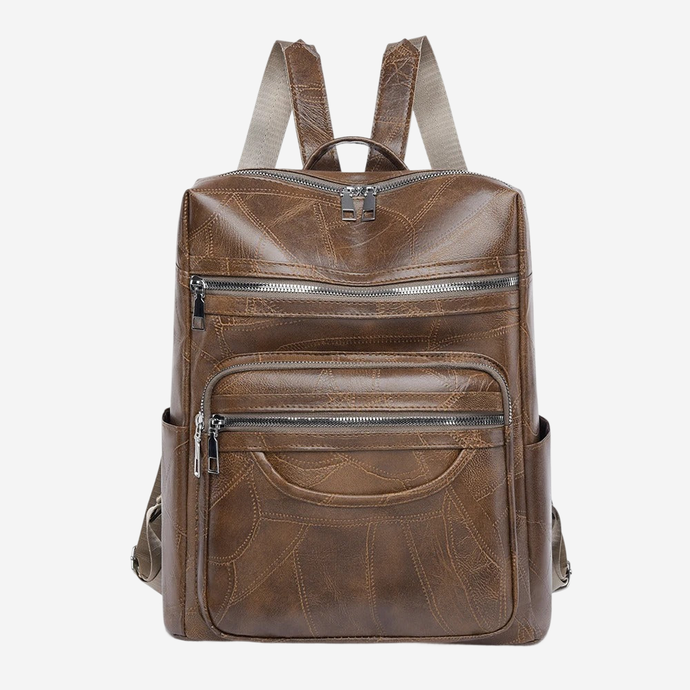 A brown leather backpack with multiple zippers and pockets.