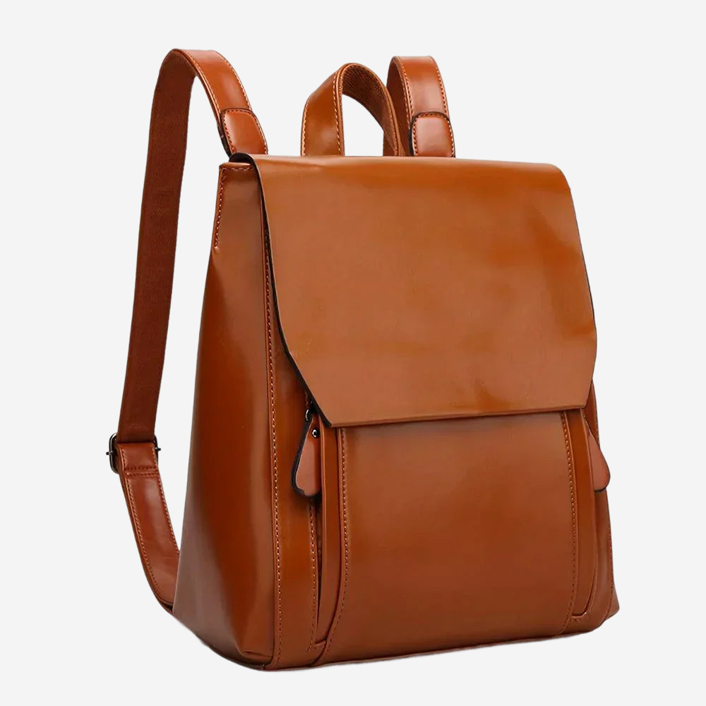 A brown leather backpack with a flap closure and two shoulder straps.