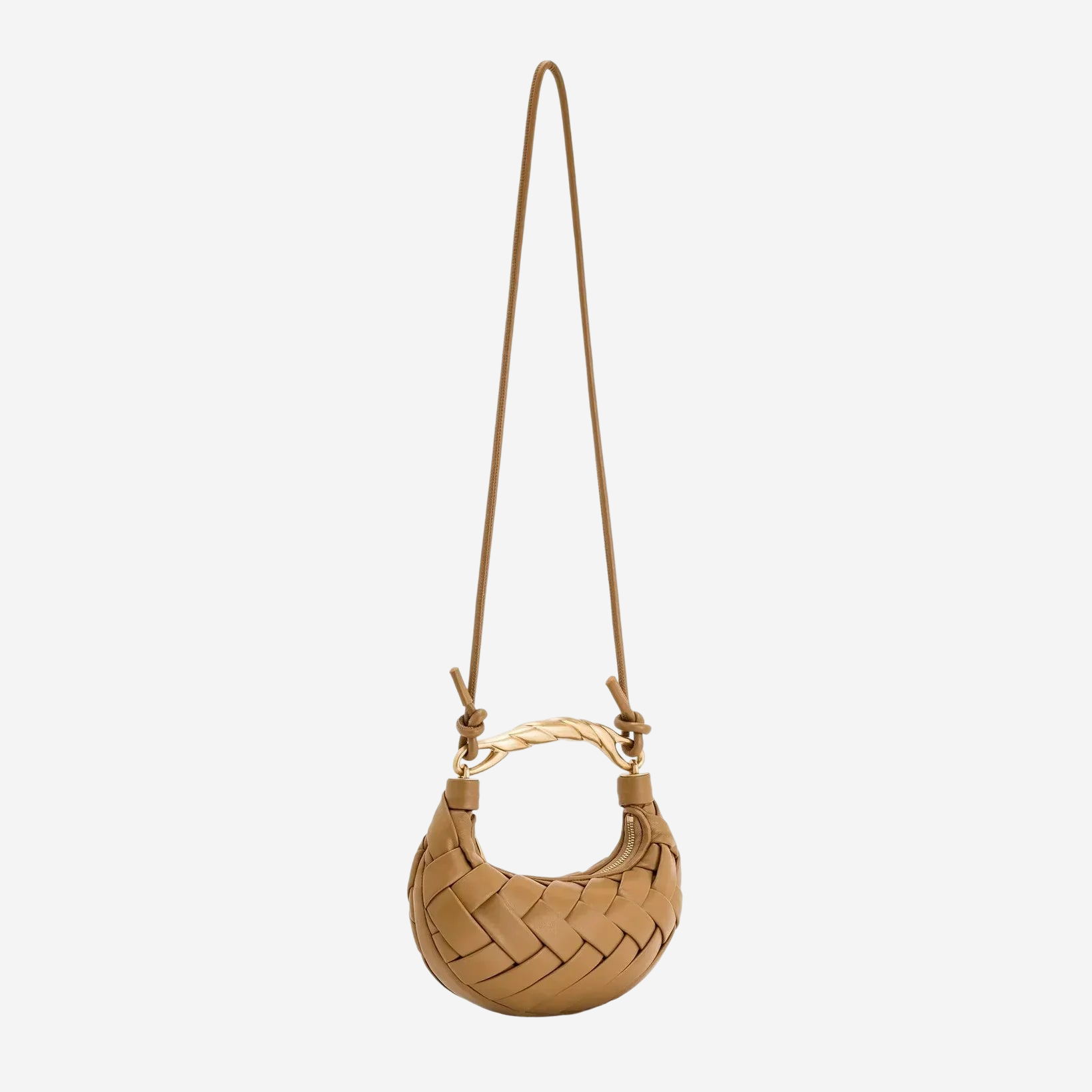 A tan woven purse with a handle and a gold-colored clasp hanging from a long strap.