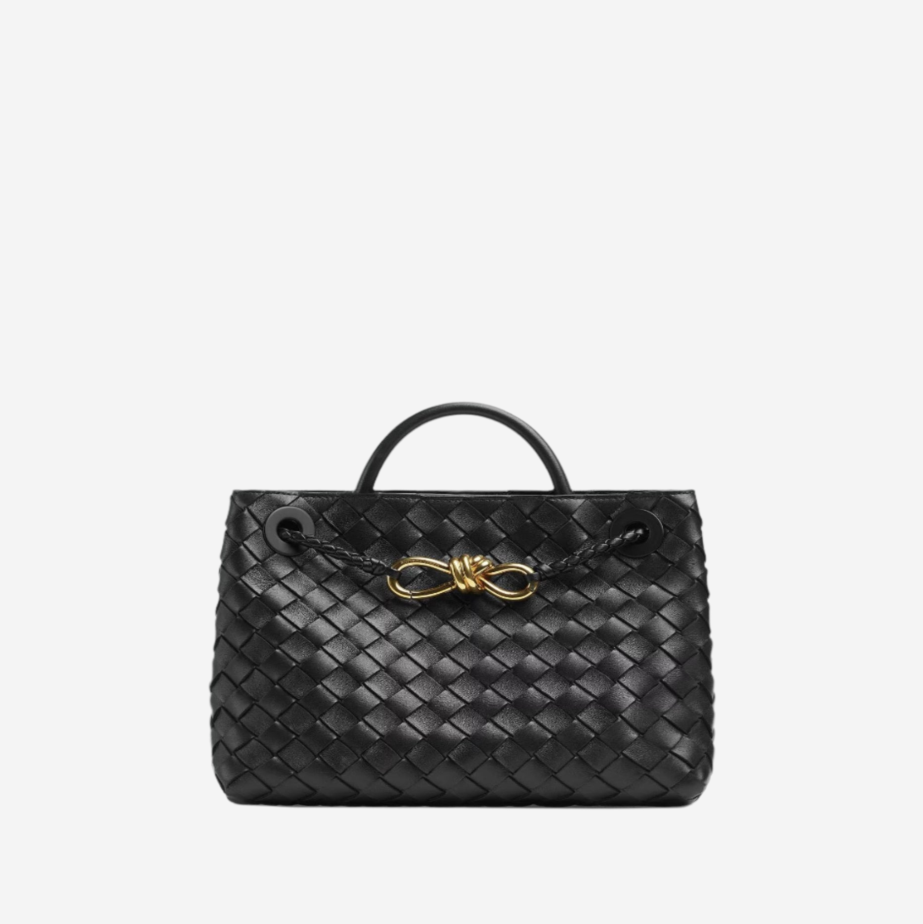 A black woven handbag with a gold buckle detail.