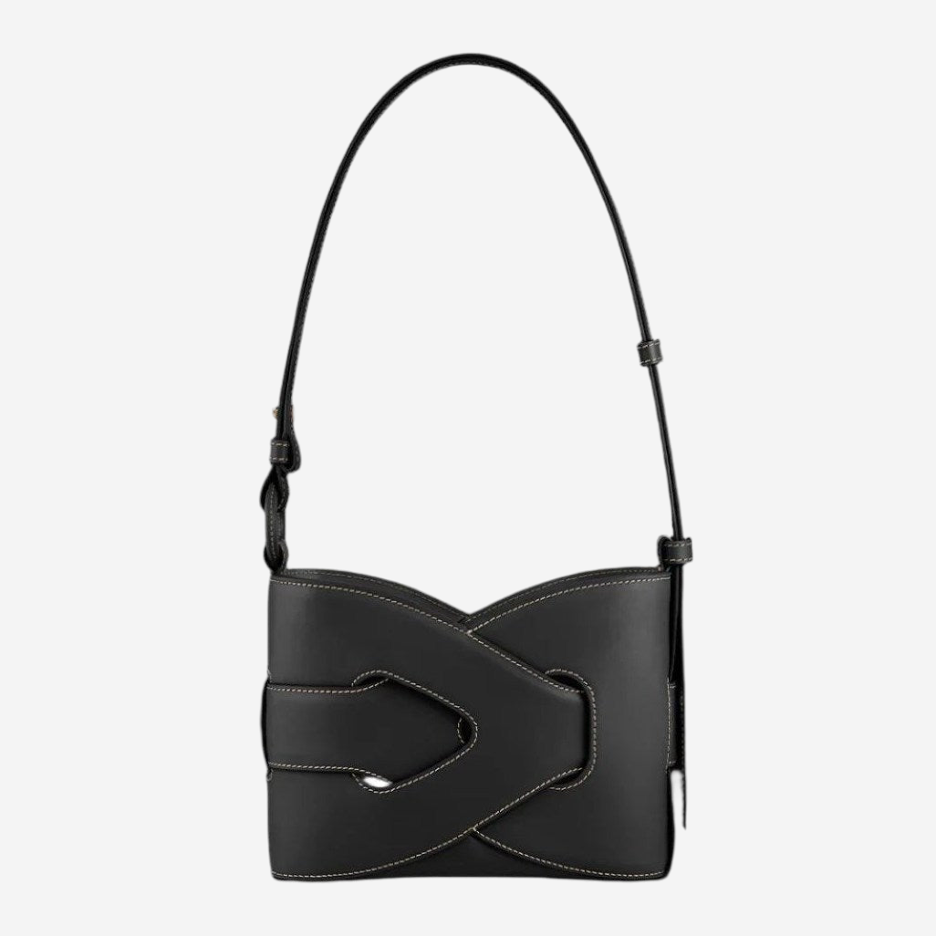 A black leather handbag with a curved handle and a distinctive buckle detail.