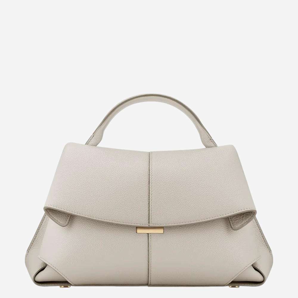 A beige leather handbag with a gold-colored clasp and handle.