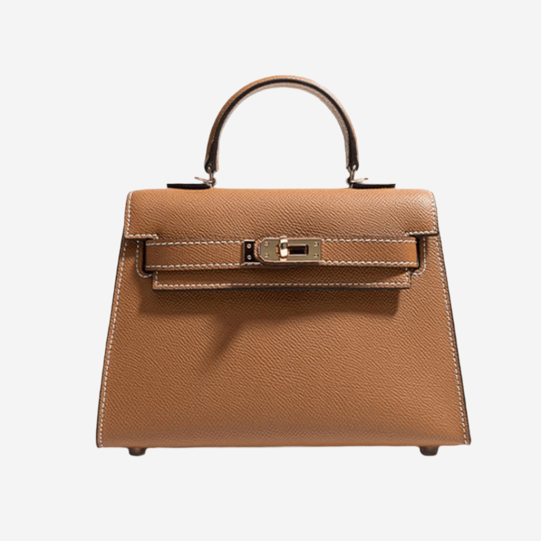 A tan leather handbag with a gold-colored lock and handle.