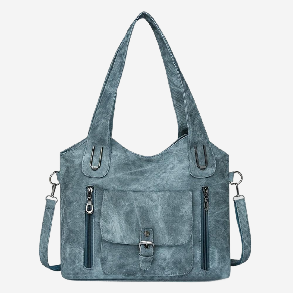 A gray, textured handbag with multiple zippers and a front pocket.