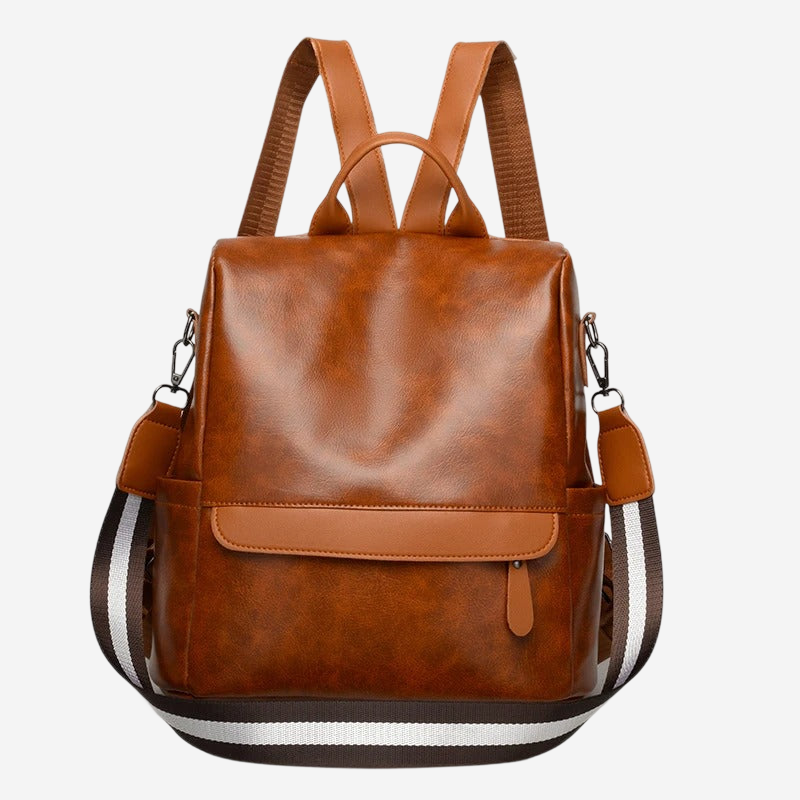 A brown leather backpack with a black and white striped strap.