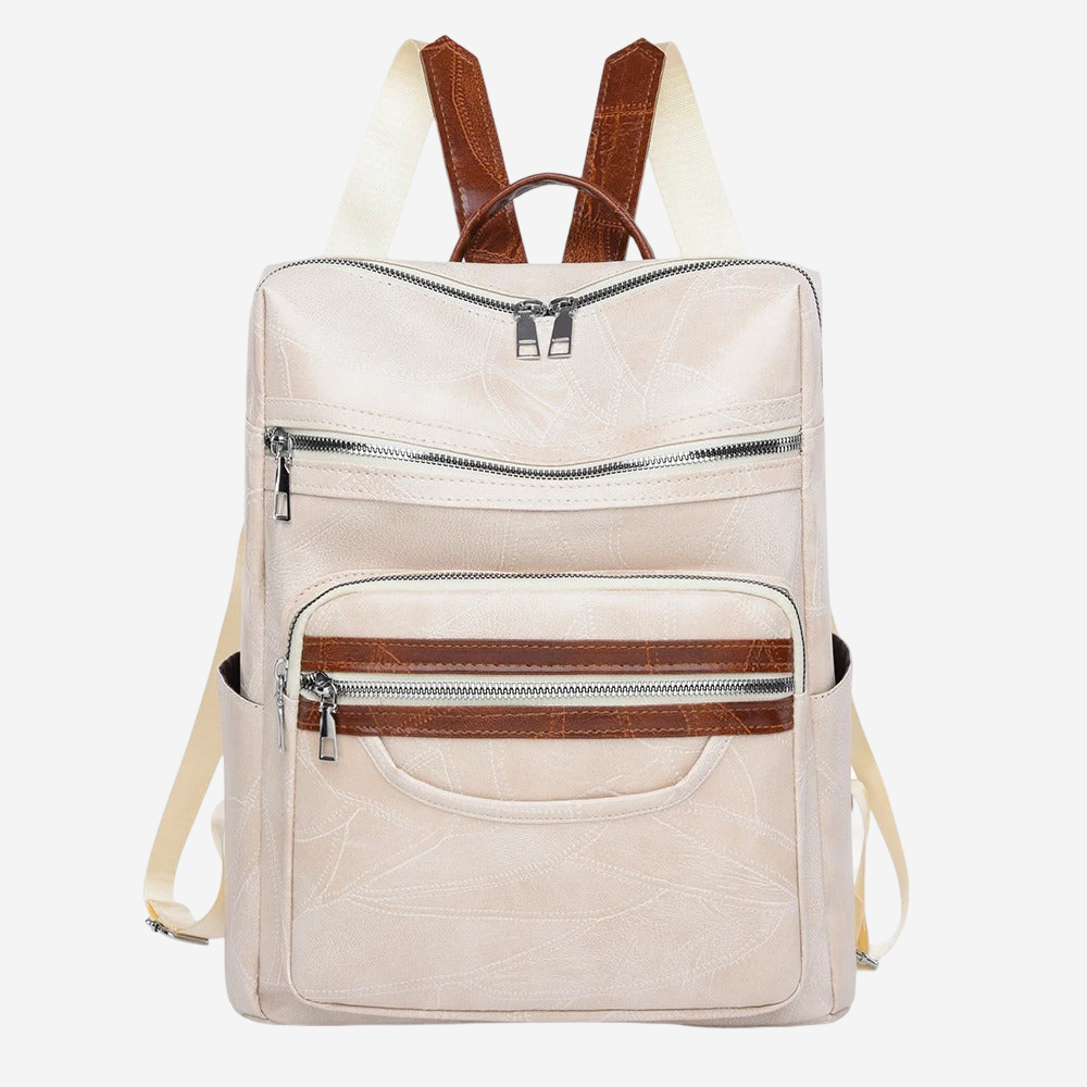 A beige backpack with brown straps and multiple zippers.