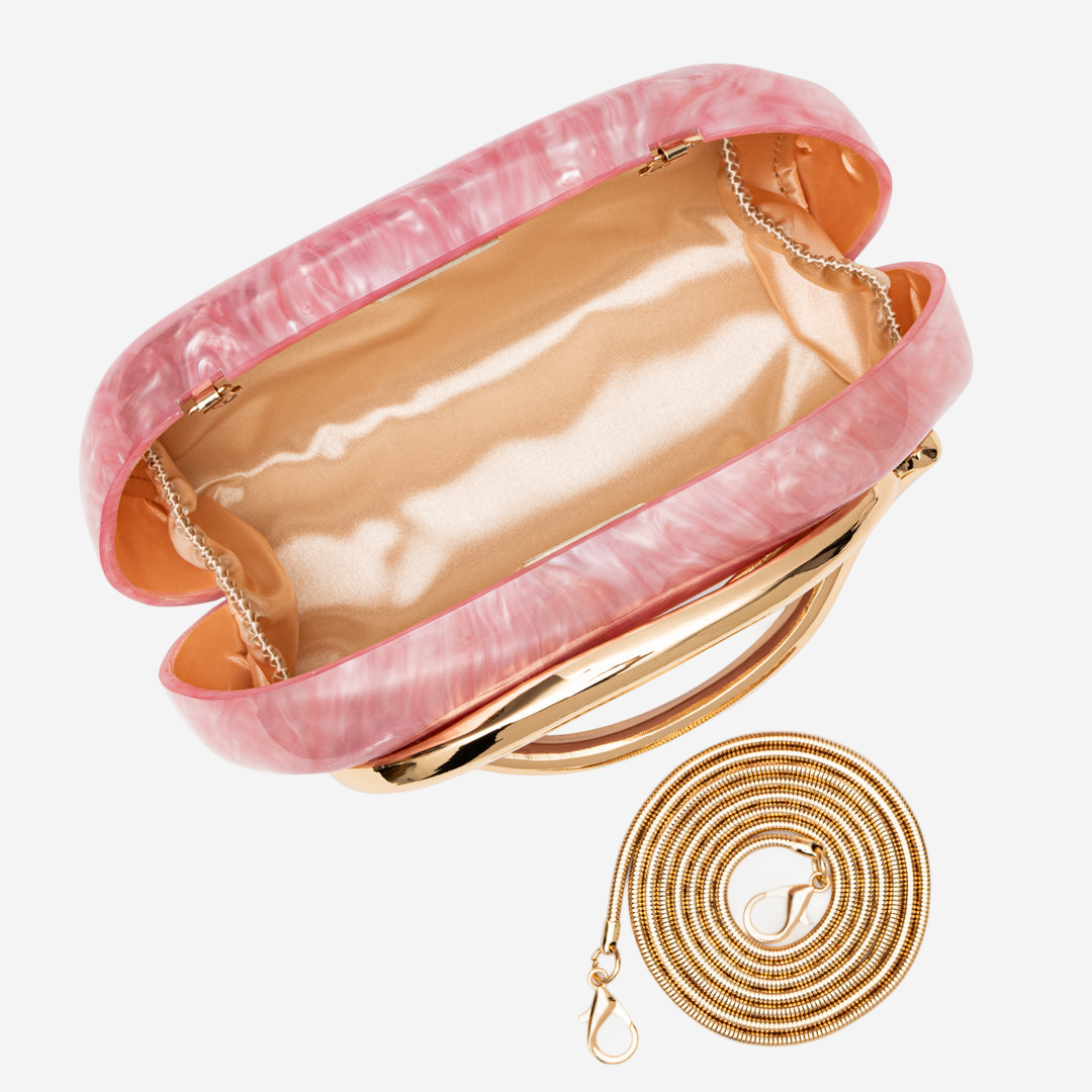 A pink and gold clutch purse with a gold chain strap is shown in the image.