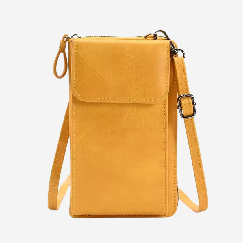 A yellow leather crossbody bag with a zipper closure and a metal clasp.