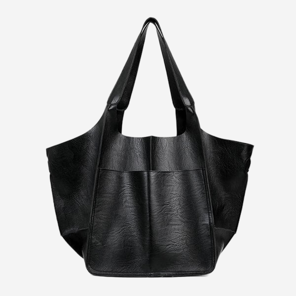 A large black leather tote bag with two handles and a front pocket.