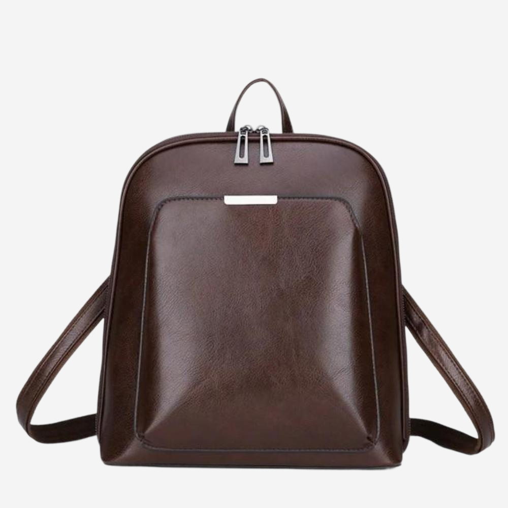 A brown leather backpack with a front pocket and two zippers on the top.