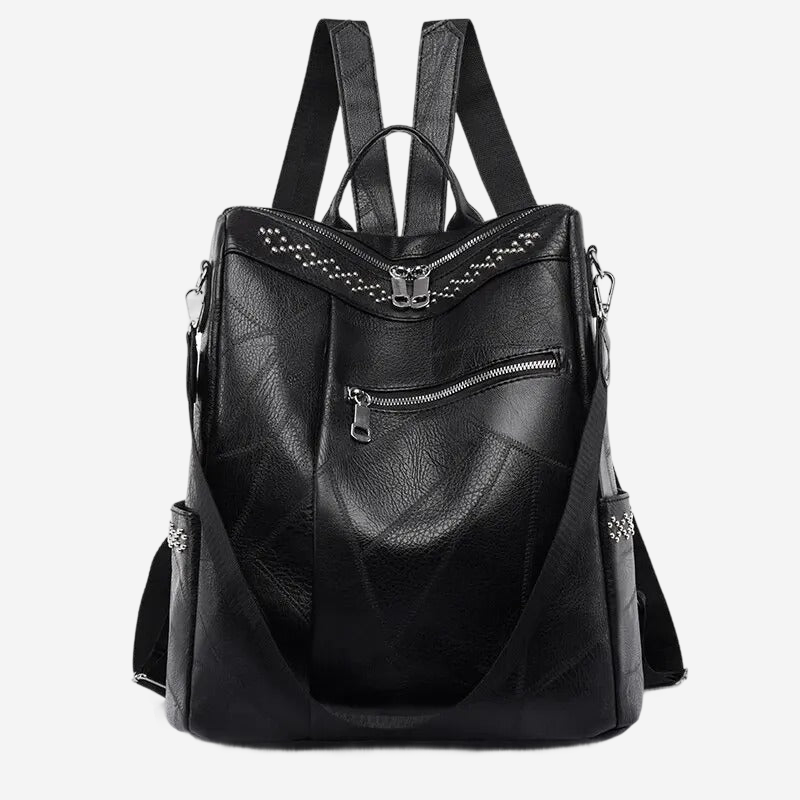 A black leather backpack with multiple zippers and pockets.