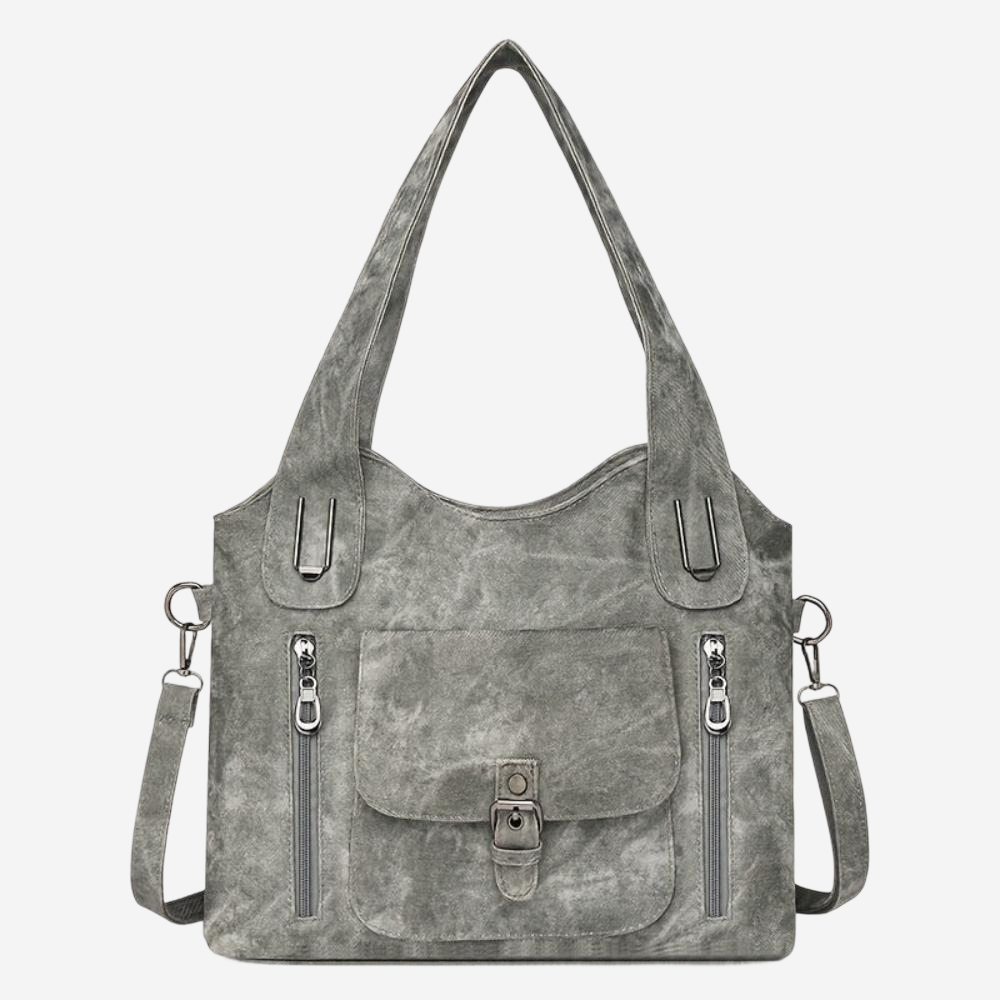 A gray tote bag with multiple zippers and a front pocket.