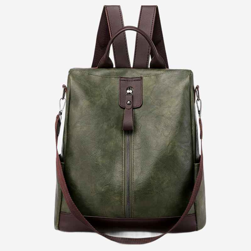 A green leather backpack with a brown strap and two shoulder straps.