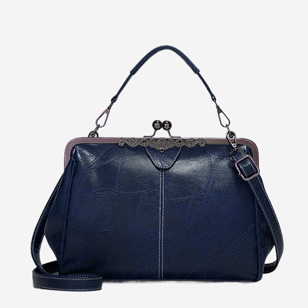 A navy blue leather handbag with a lace-up closure and a metal clasp.