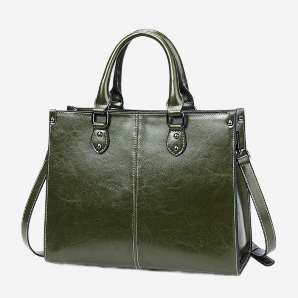 A dark green leather handbag with two handles and a shoulder strap.