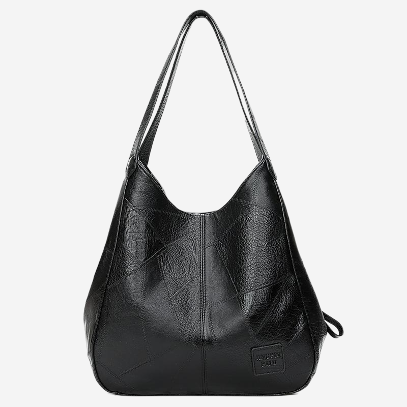 A black leather tote bag with a distinctive triangular shape and two handles.