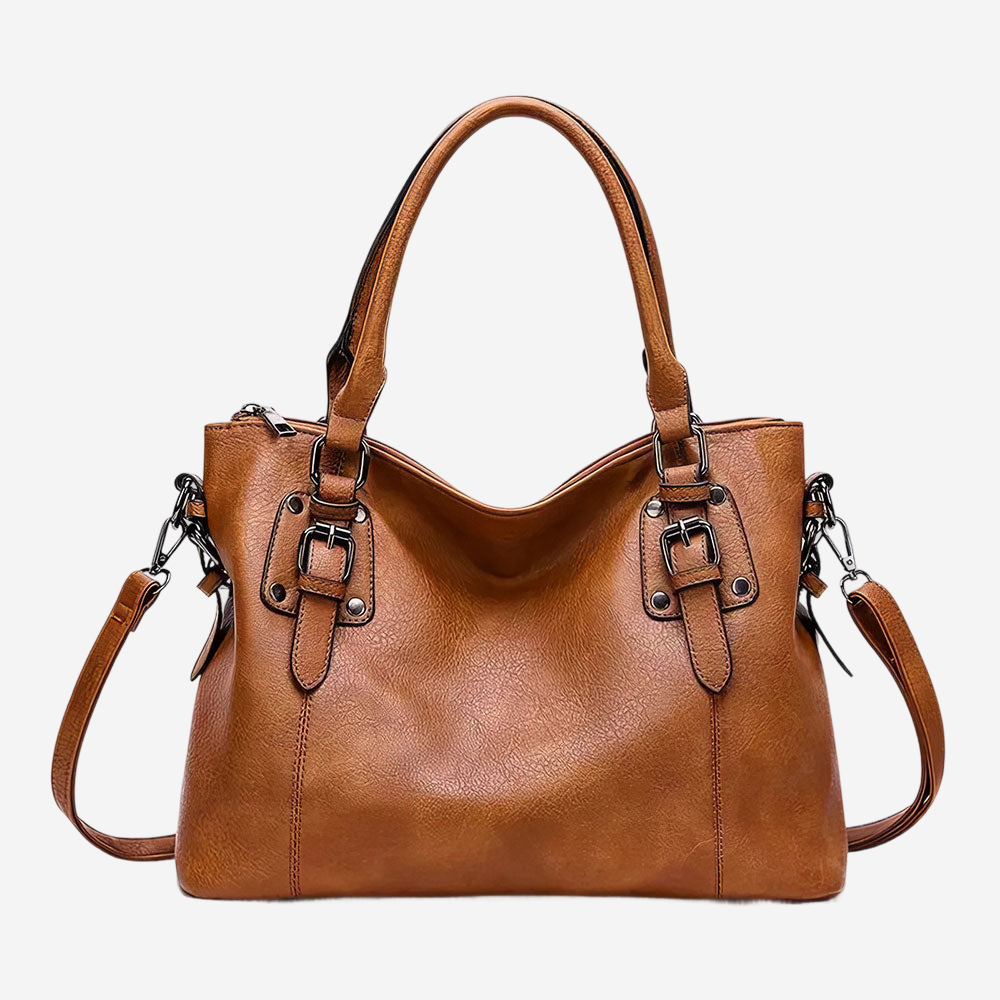 A brown leather handbag with multiple straps and buckles, designed for carrying various items.