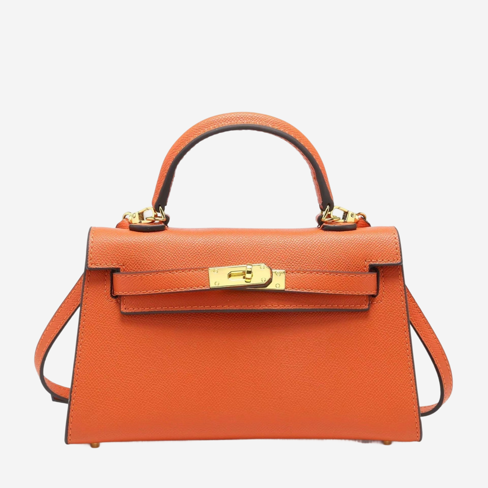An orange leather handbag with a gold lock closure and two gold-colored handles.