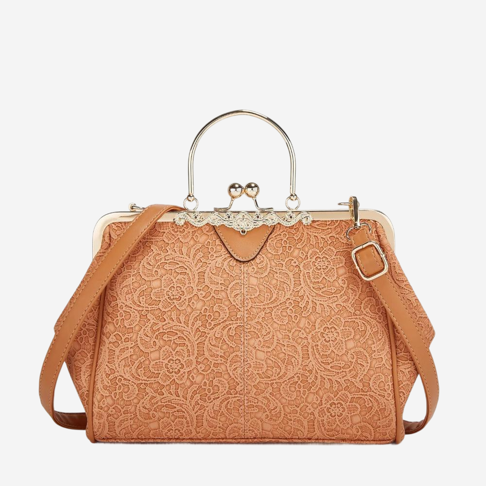A tan-colored handbag with a lace pattern and a metal clasp closure.