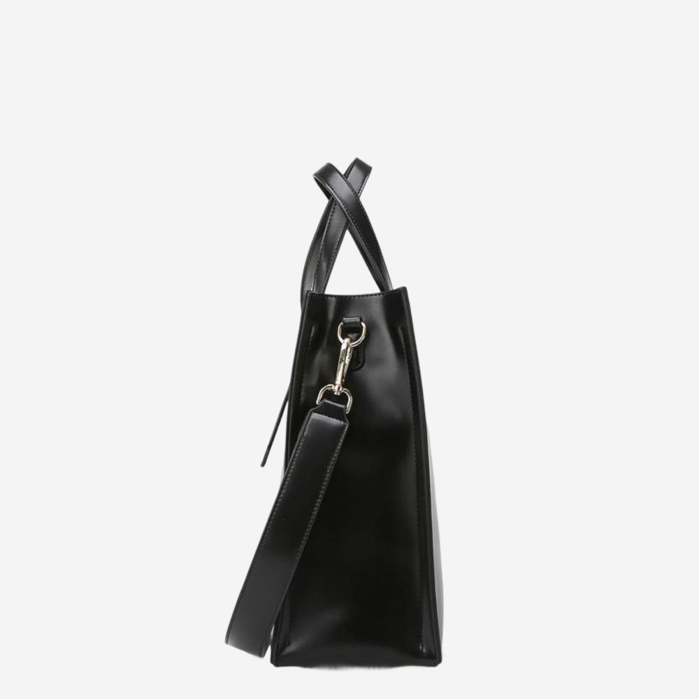A black leather tote bag with a metal clasp and strap.