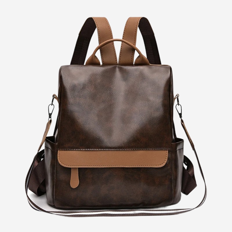A brown leather backpack with a brown leather trim, featuring a brown leather handle and straps.