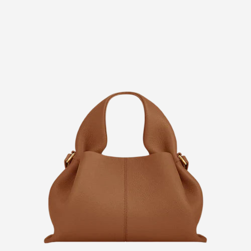 A brown leather handbag with a curved handle and gold hardware.
