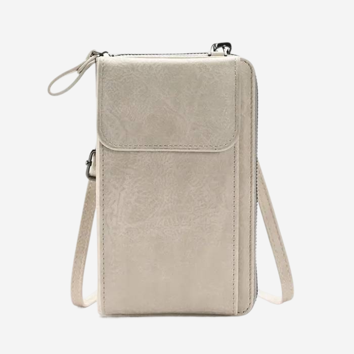 A tan-colored crossbody bag with a zipper closure and a front pocket.