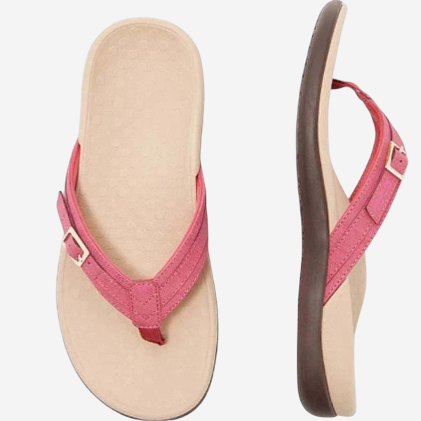 A pair of pink flip-flops with a brown strap.