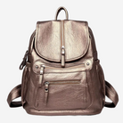 A metallic brown leather backpack with multiple pockets and zippers.