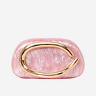 A pink, textured clutch purse with a gold-colored metal clasp.