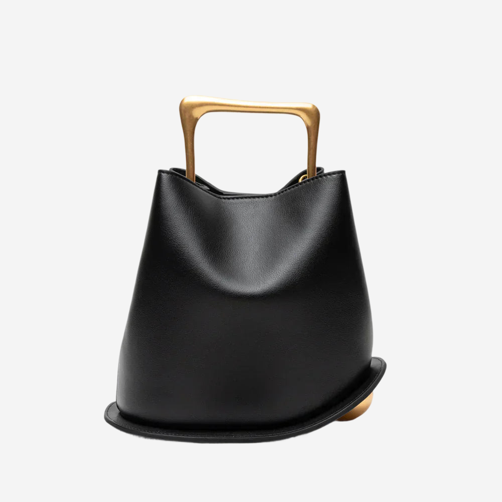 A black leather handbag with a gold handle.
