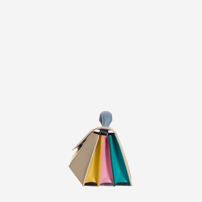 A colorful handbag with a unique design, featuring a combination of pastel and vibrant colors.