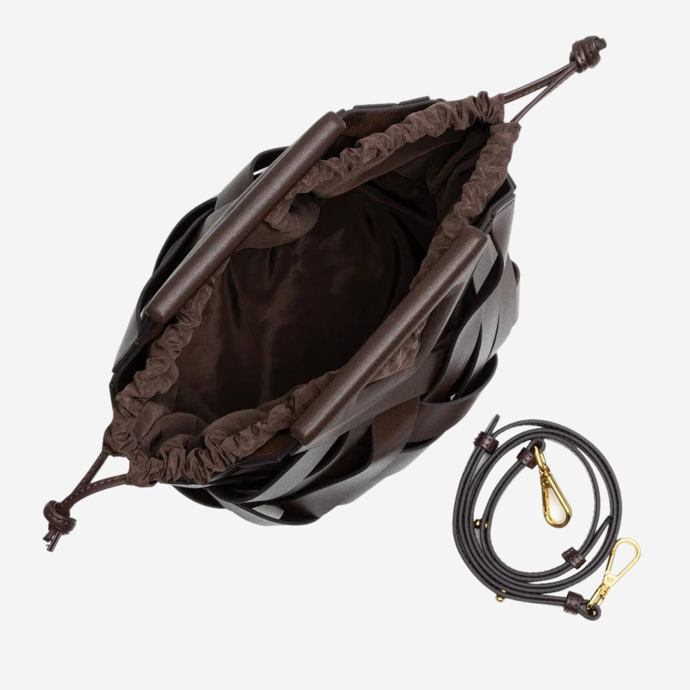 A brown leather handbag with a drawstring closure and a gold metal buckle strap.