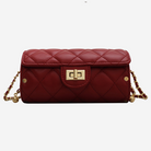A red quilted leather handbag with a gold lock closure and chain strap.