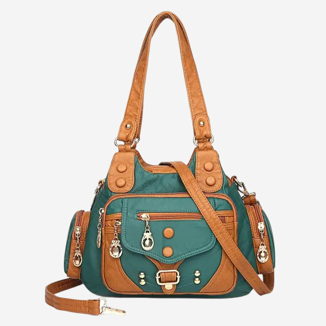 A green and brown handbag with multiple pockets and zippers, featuring a leather strap and metal hardware.