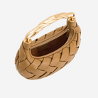 A tan woven handbag with a gold handle and zipper.
