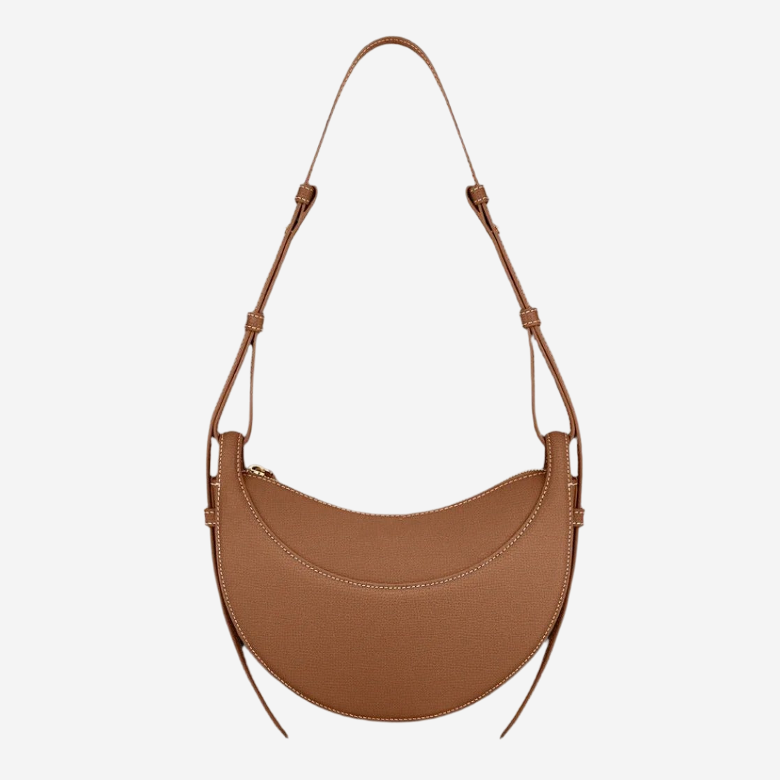 A brown leather handbag with a curved shape and a strap.