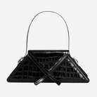 A black handbag with a crocodile skin texture and a triangular shape.