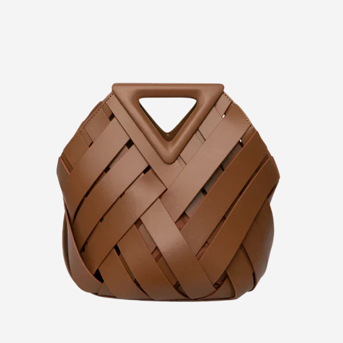 A brown leather handbag with a woven texture and a triangular handle.