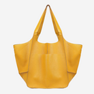 A large yellow tote bag with two handles and a front pocket.