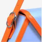 A close-up view of a blue and orange leather strap with a metal buckle, suggesting a stylish accessory.