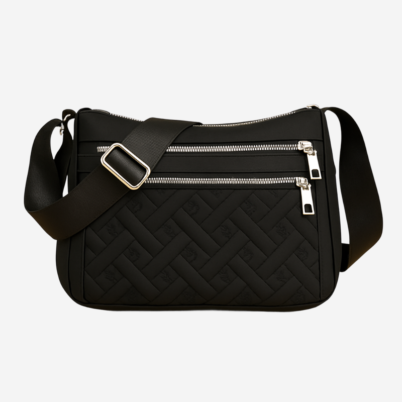A black crossbody bag with multiple zippers and a leather strap.